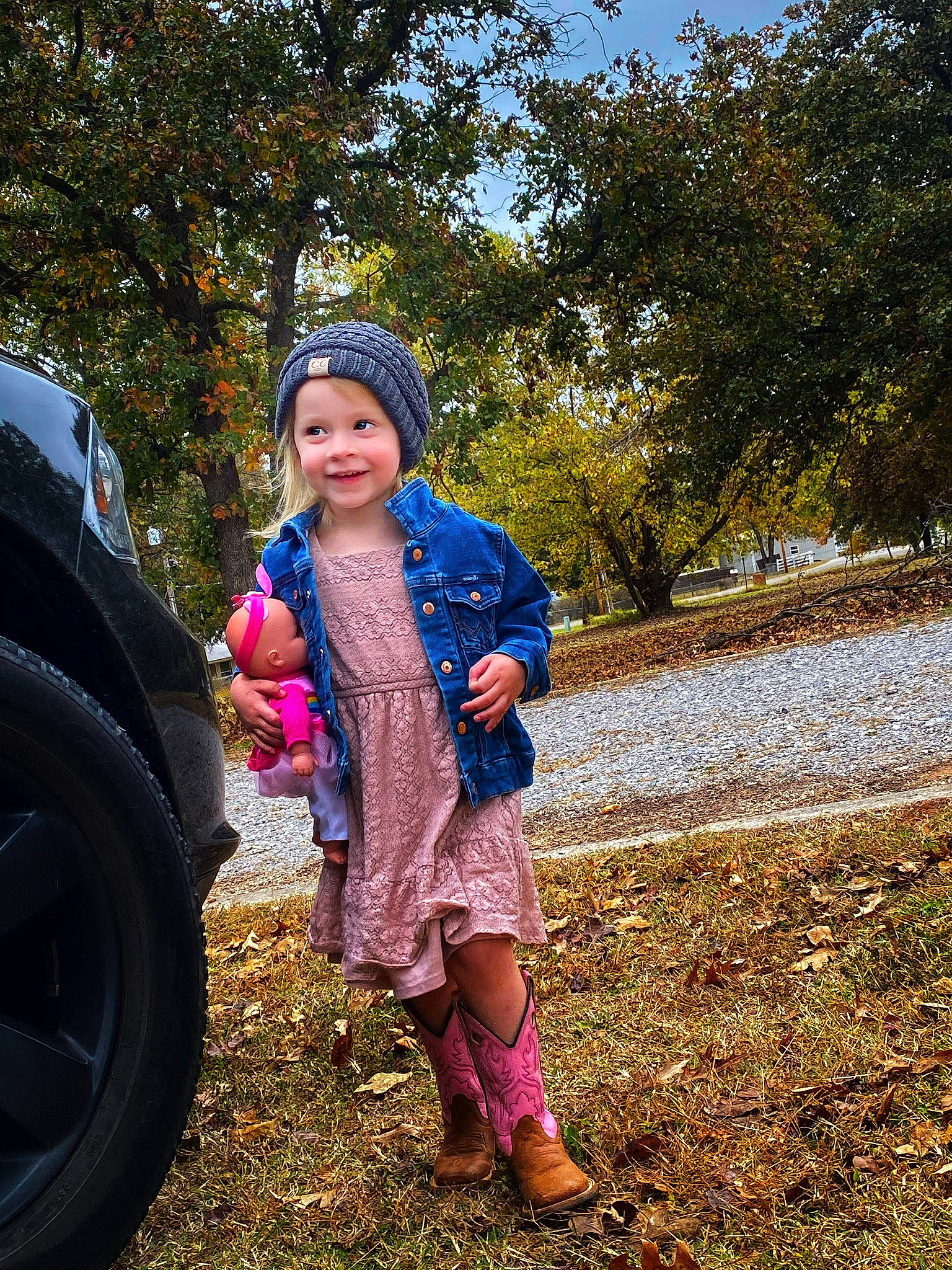 Addie joined the competition — help win amazing prizes! automotive_tire, denim, electric_blue, eye, fun, grass, happy, headwear, joy, landscape, leisure, magenta, people_in_nature, person, plant, synthetic_rubber, tints_and_shades, tire, toddler, tread