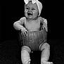 Darcie-Rose is registered to the contest to win money with this photo: baby, pumpkin, headband, bow, smiling, happy, child, infant, cute, portrait, sitting, barefoot, bracelet, black_and_white, studio, holiday, seasonal, fun, playful, celebration