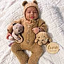 Dylan joined the competition — help win amazing prizes! baby, bear_ears, blanket, child, cozy, cute, hand_bracelet, infant, knitted_outfit, lying_down, newborn, plush_toy, portrait, sleepy, smiling, soft_texture, stuffed_animal, two_months, warm_colors, wooden_sign
