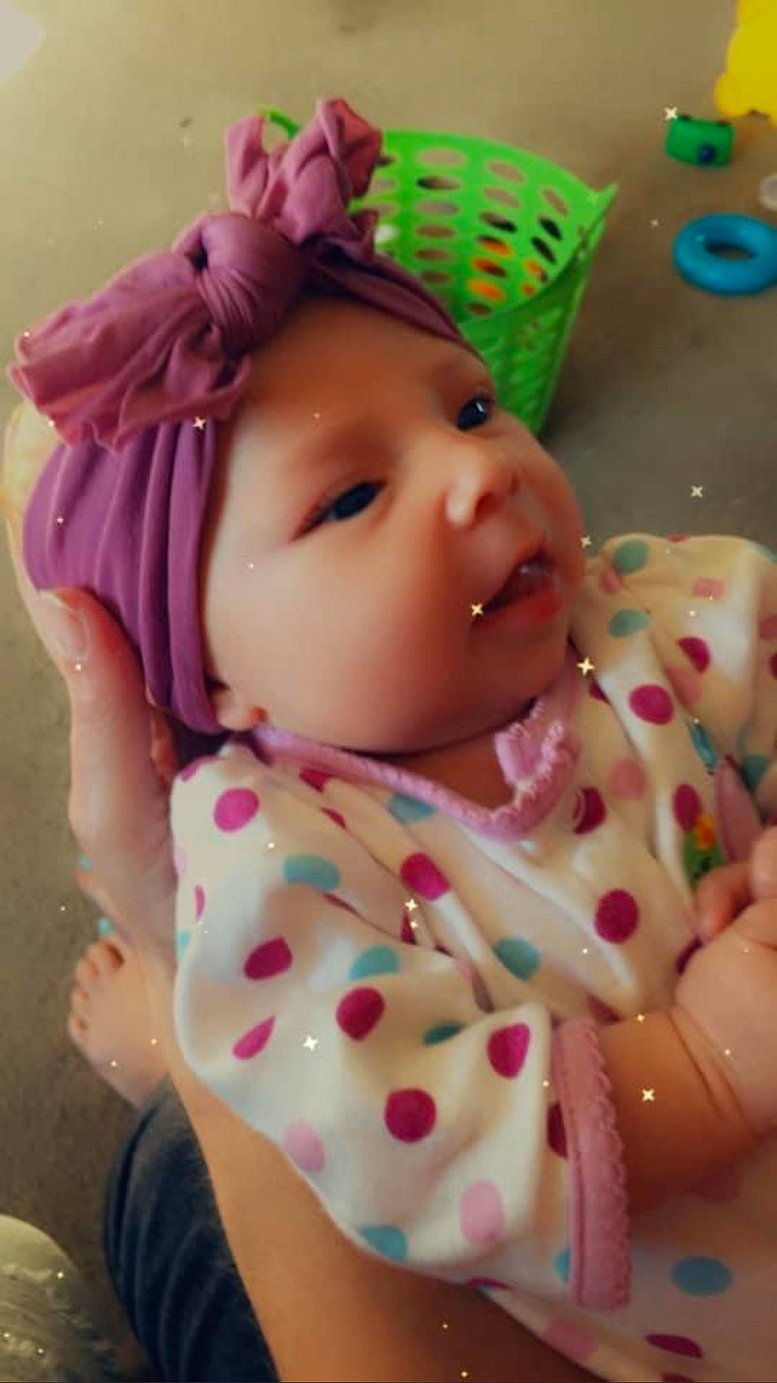 Sophia is registered to the contest to win money with this photo: baby, cheek, child, headgear, headwear, mouth, person, pink, skin, toddler