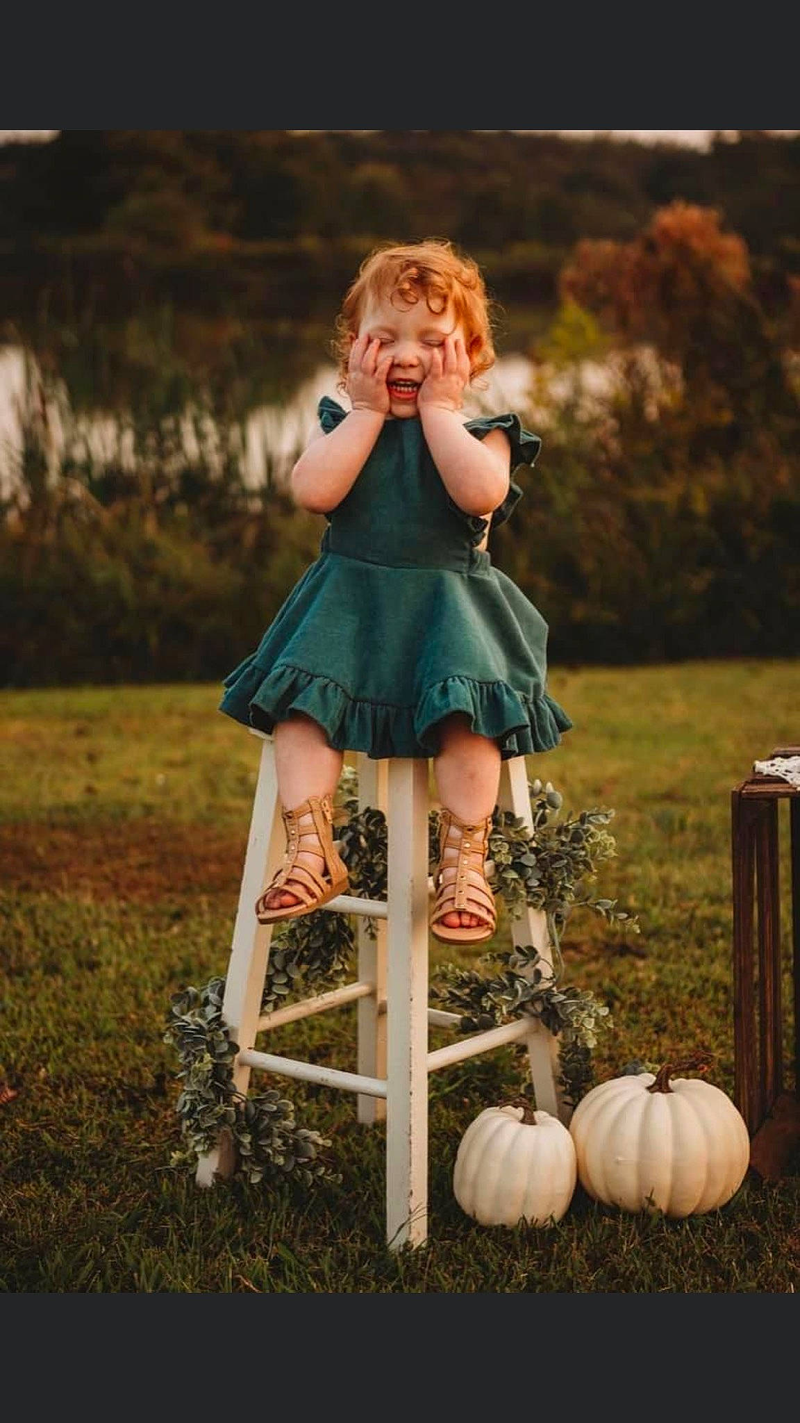 Sophia is registered to the contest to win money with this photo: blond, boot, calabaza, dress, flash_photography, gourd, grass, grassland, hair, happy, human_leg, knee, leg, nature, orange, people_in_nature, person, plant, pumpkin, recreation