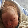 Elio participe au concours pour gagner de l'argent avec cette photo : baby, blanket, child, closeup, cozy, cuddle, face, head, indoors, infant, newborn, peaceful, portrait, quiet, rest, skin, sleeping, soft, warm, wrapped