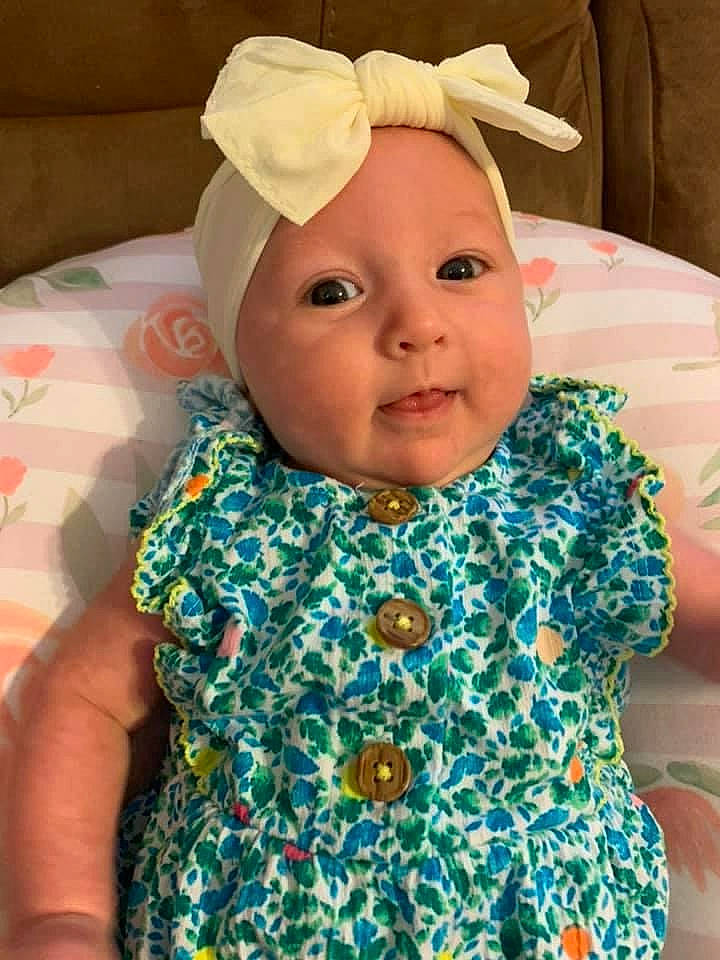 Maisie joined the competition — help win amazing prizes! baby, baby_toddler_clothing, cheek, clothing, collar, eye, face, happy, head, headwear, iris, linens, outerwear, pattern, person, pink, skin, sleeve, smile, textile