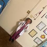 Ivyonna is registered to the contest to win money with this photo: architecture, building, child, clinic, clothing, coat, doctor, face, female, footwear, girl, head, hospital, labcoat, longsleeve, person, photography, portrait, shoe, sleeve