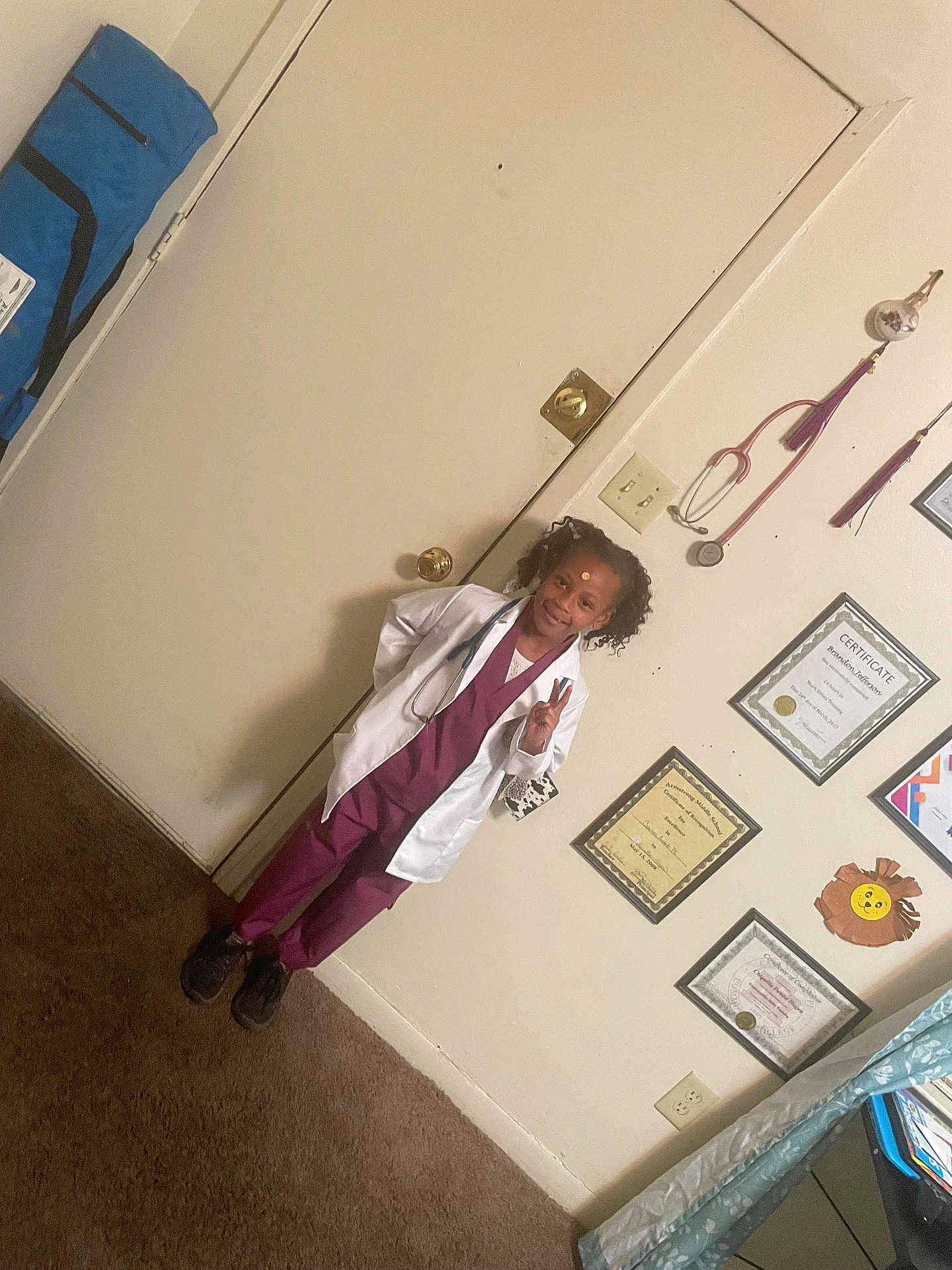 Ivyonna is registered to the contest to win money with this photo: architecture, building, child, clinic, clothing, coat, doctor, face, female, footwear, girl, head, hospital, labcoat, longsleeve, person, photography, portrait, shoe, sleeve