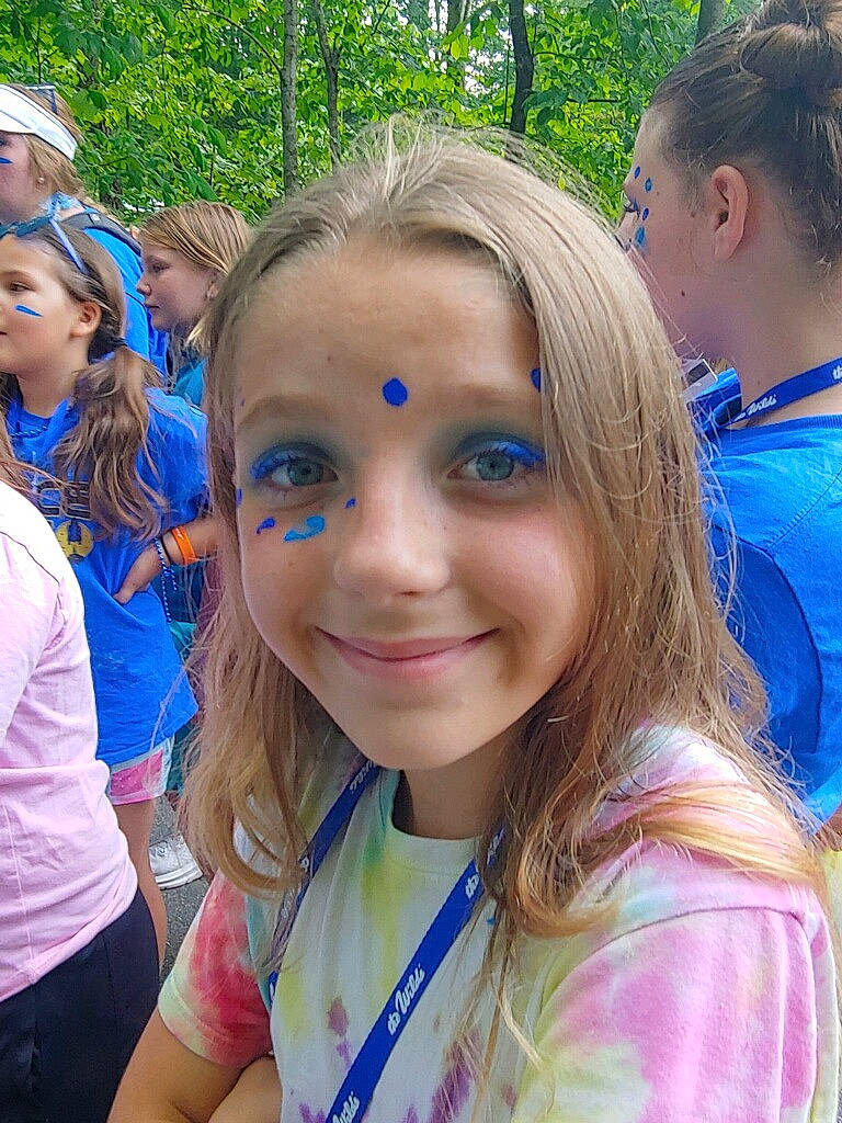 Trinity is registered to the contest to win money with this photo: blond, blue, brown_hair, child, electric_blue, event, fun, grass, happy, iris, joy, leisure, nature, person, recreation, shorts, smile, spring, summer, t_shirt