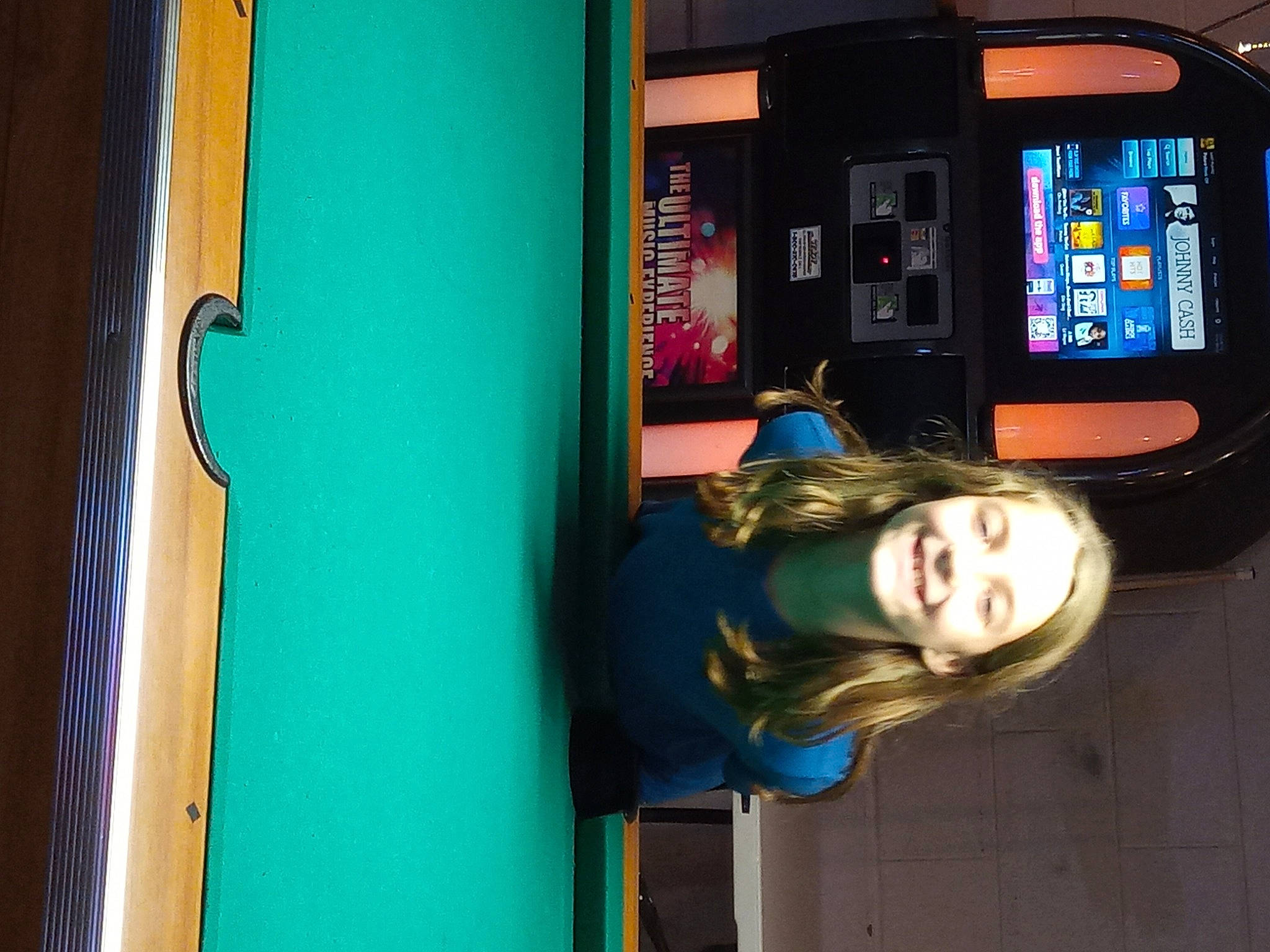 Trinity is registered to the contest to win money with this photo: communication_device, display_device, door, electric_blue, fun, gadget, joy, leisure, machine, mobile_phone, multimedia, person, portable_communications_device, recreation, room, transport