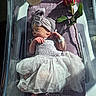 Raegan joined the competition — help win amazing prizes! newborn, baby, sleeping, tutu, headwrap, rose, bassinet, transparent, soft_light, delicate, fabric, peaceful, infant, clothing, flower, portrait, cute, small, resting, nursery