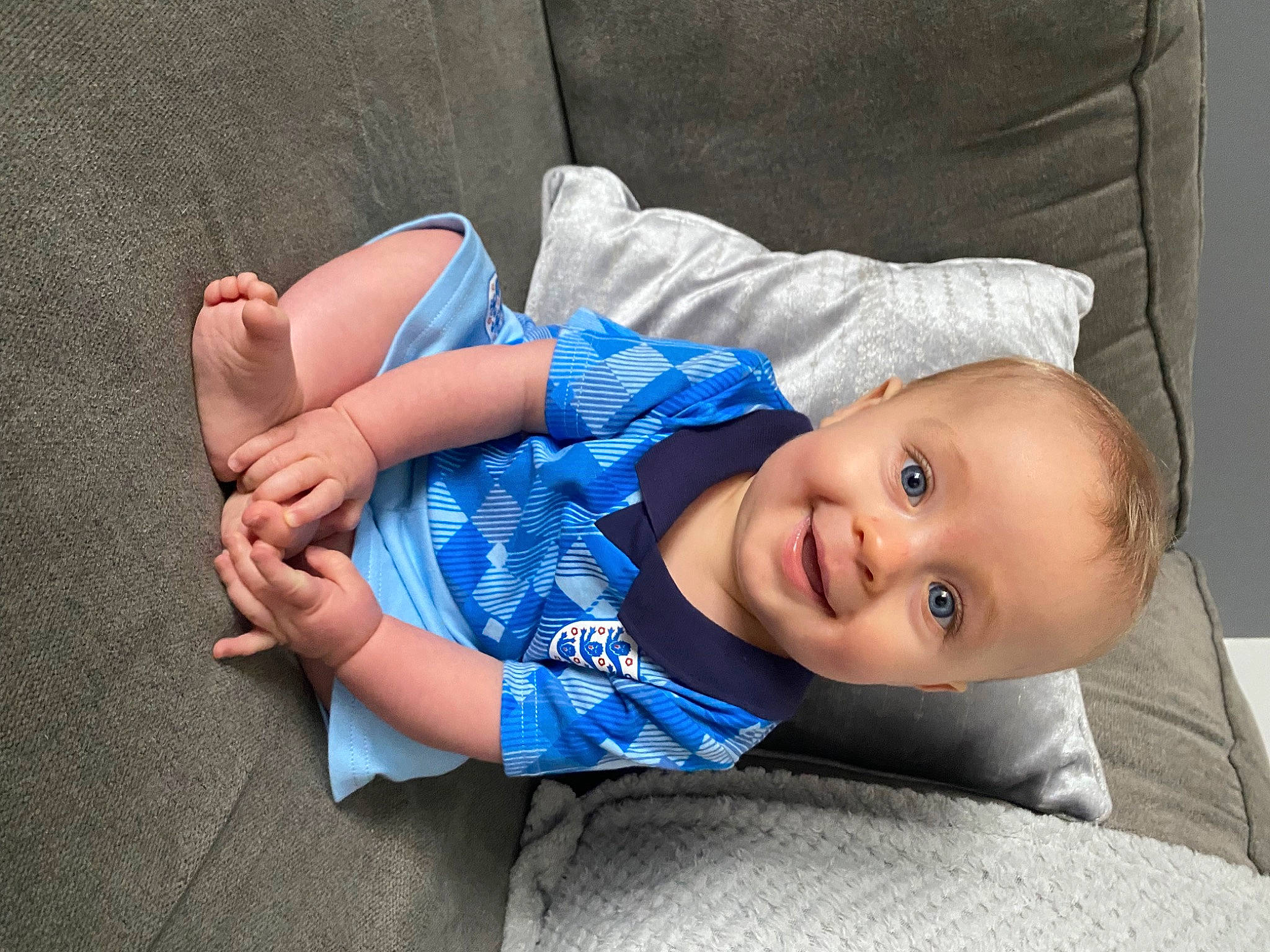 Fraser joined the competition — help win amazing prizes! baby, baby_toddler_clothing, child, comfort, denim, elbow, electric_blue, flash_photography, fun, gesture, grass, happy, joy, person, portrait_photography, sitting, skin, sleeve, smile, textile
