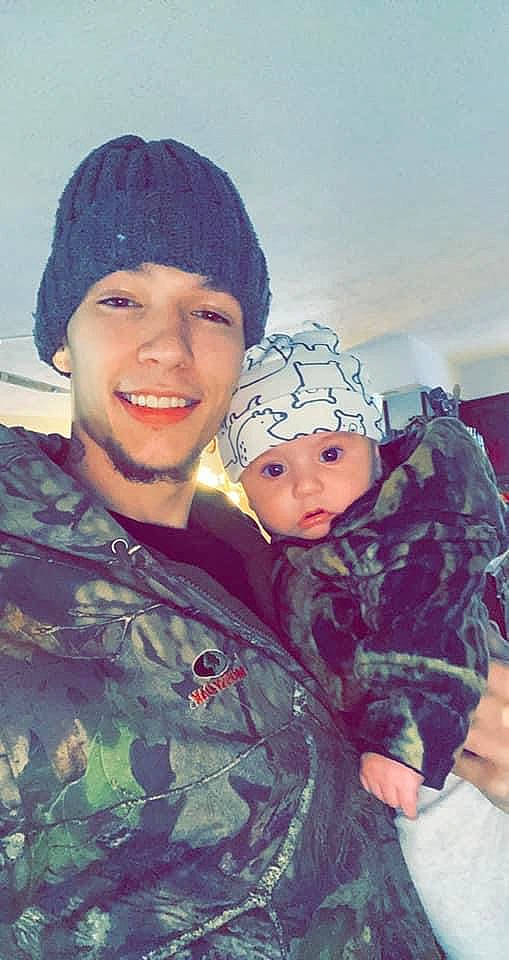 Douglas is registered to the contest to win money with this photo: camouflage, cap, cool, face, freezing, fun, gesture, happy, headgear, headwear, jacket, joy, marines, military_camouflage, military_person, military_uniform, non_commissioned_officer, outerwear, person, smile