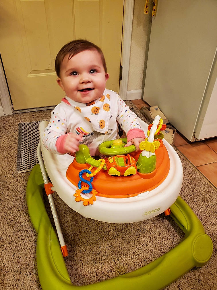 Audree joined the competition — help win amazing prizes! baby, baby_playing_with_toys, baby_products, baby_safety, baby_toddler_clothing, baby_toys, bib, child, door, human, human_body, joy, person, plastic, riding_toy, sitting, toddler