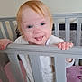 Mia-Louise joined the competition — help win amazing prizes! baby, bedding, blue_eyes, child, crib, cute, furniture, grip, hand, indoor, infant, light_hair, nursery, pajamas, person, playful, sleepwear, smiling, tongue_out, young_child
