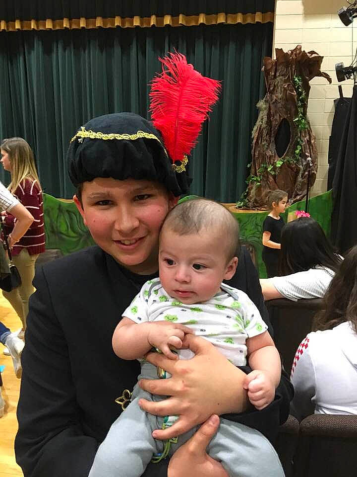 Javier is registered to the contest to win money with this photo: child, daughter, headwear, joy, person, toddler