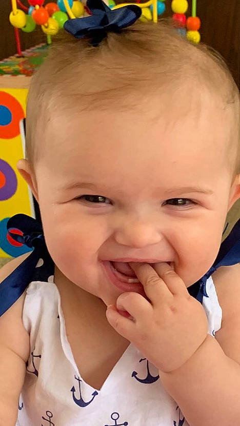 Saylor is registered to the contest to win money with this photo: baby, cheek, child, chin, close_up, ear, eye, eyebrow, face, facial_expression, forehead, fun, head, joy, lip, mouth, nose, organ, person, skin