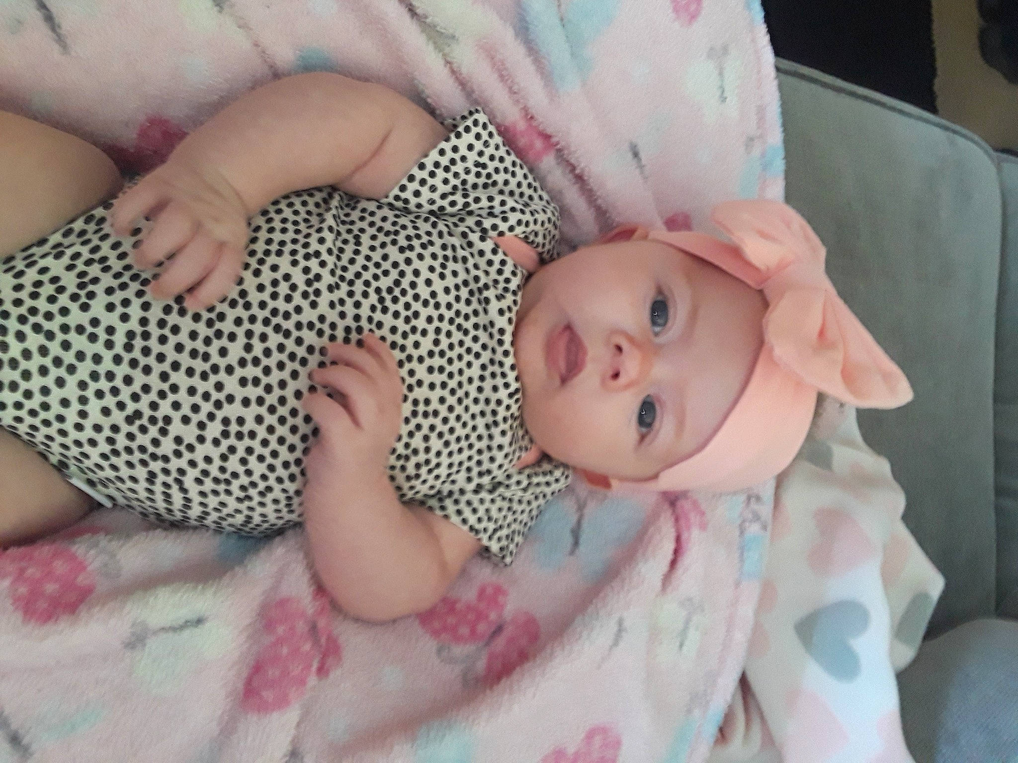 Gwenyth is registered to the contest to win money with this photo: baby, bedtime, birth, cheek, child, head, headwear, mouth, person, pink, skin, smile, toddler