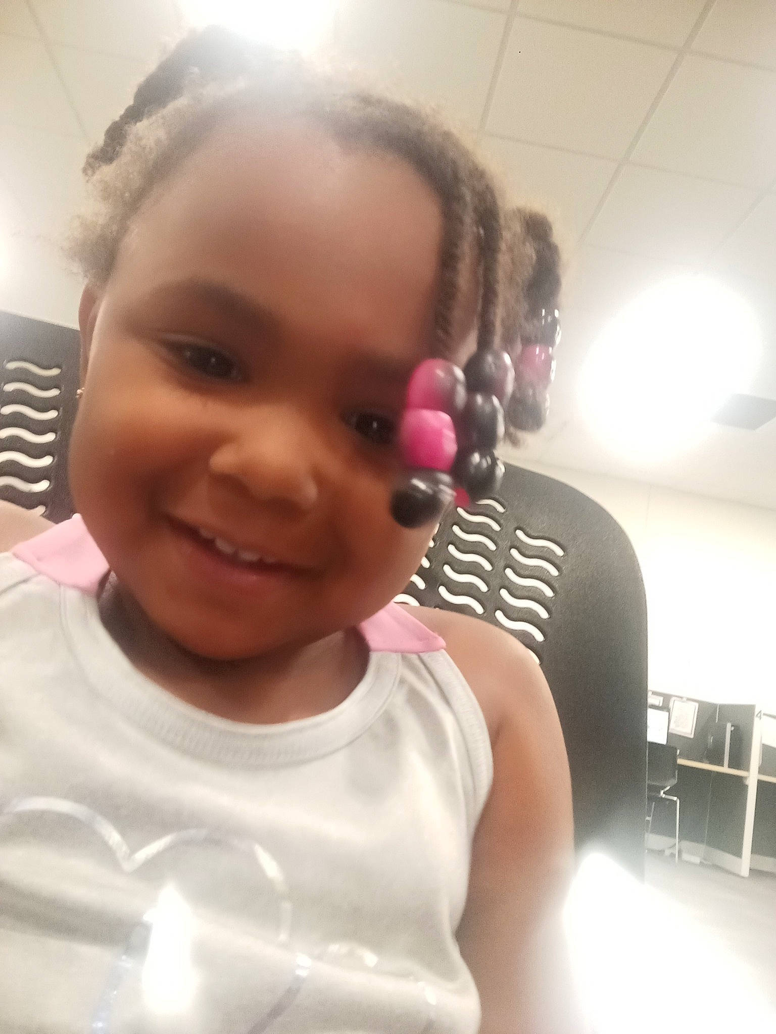 Zyrá is registered to the contest to win money with this photo: audio_equipment, black_hair, chest, child, cool, ear, eyebrow, eyelash, forehead, fun, hairstyle, happy, jaw, joy, lip, long_hair, neck, nose, person, shoulder