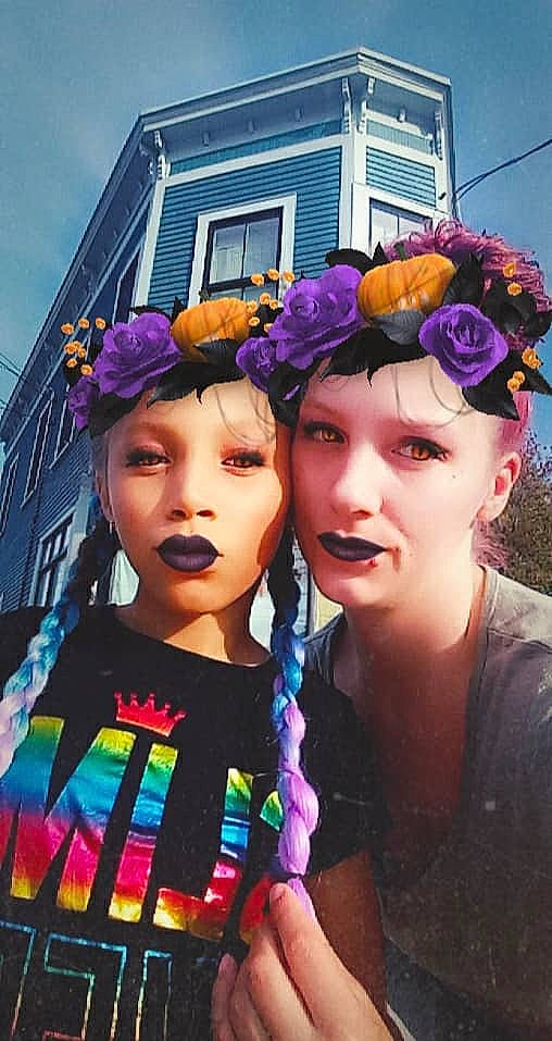 Shania joined the competition — help win amazing prizes! child, costume, fashion_accessory, flower, fun, hair_accessory, hair_coloring, headgear, headpiece, headwear, person, photography, purple, selfie