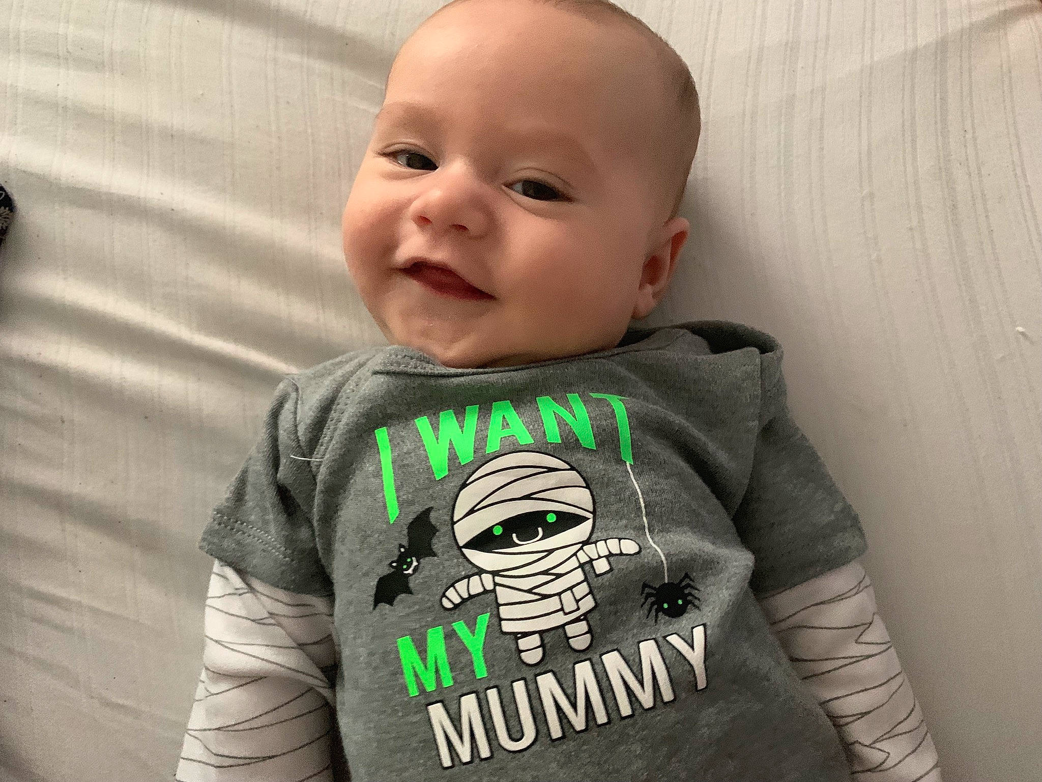 Jaxsyn is registered to the contest to win money with this photo: baby, baby_products, baby_toddler_clothing, cheek, child, cool, face, fictional_character, forehead, green, head, hoodie, nose, outerwear, person, product, sleeve, smile, t_shirt, toddler