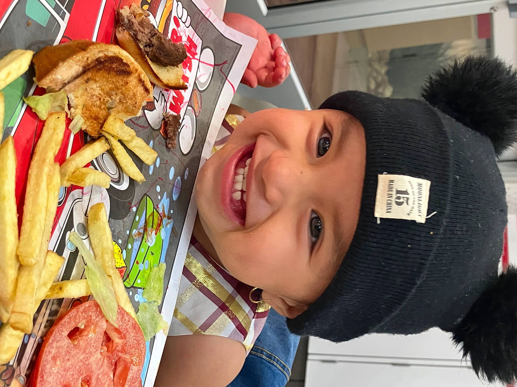 Estella is registered to the contest to win money with this photo: beanie, beauty, cap, child, fashion, fashion_accessory, food, fun, fur, happy, hat, headgear, headwear, human, joy, junk_food, person, smile, t_shirt, textile