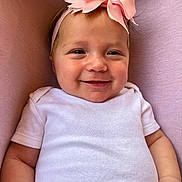 Rhedyn joined the competition — help win amazing prizes! baby, smiling, headband, pink_bow, white_onesie, infant, portrait, closeup, cute, child, soft_background, happy, skin, face, hand, clothing, young_child, indoor, person, baby_girl