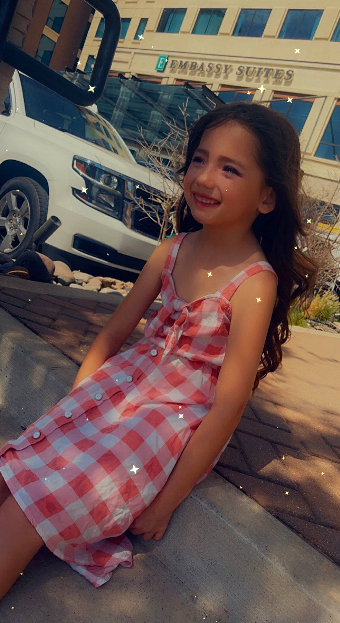 Jaylene is registered to the contest to win money with this photo: automotive_design, automotive_exterior, automotive_lighting, automotive_tire, black_hair, bumper, cool, happy, hood, joy, motor_vehicle, person, personal_luxury_car, plaid, smile, thigh, tire, travel, trunk, vehicle_door