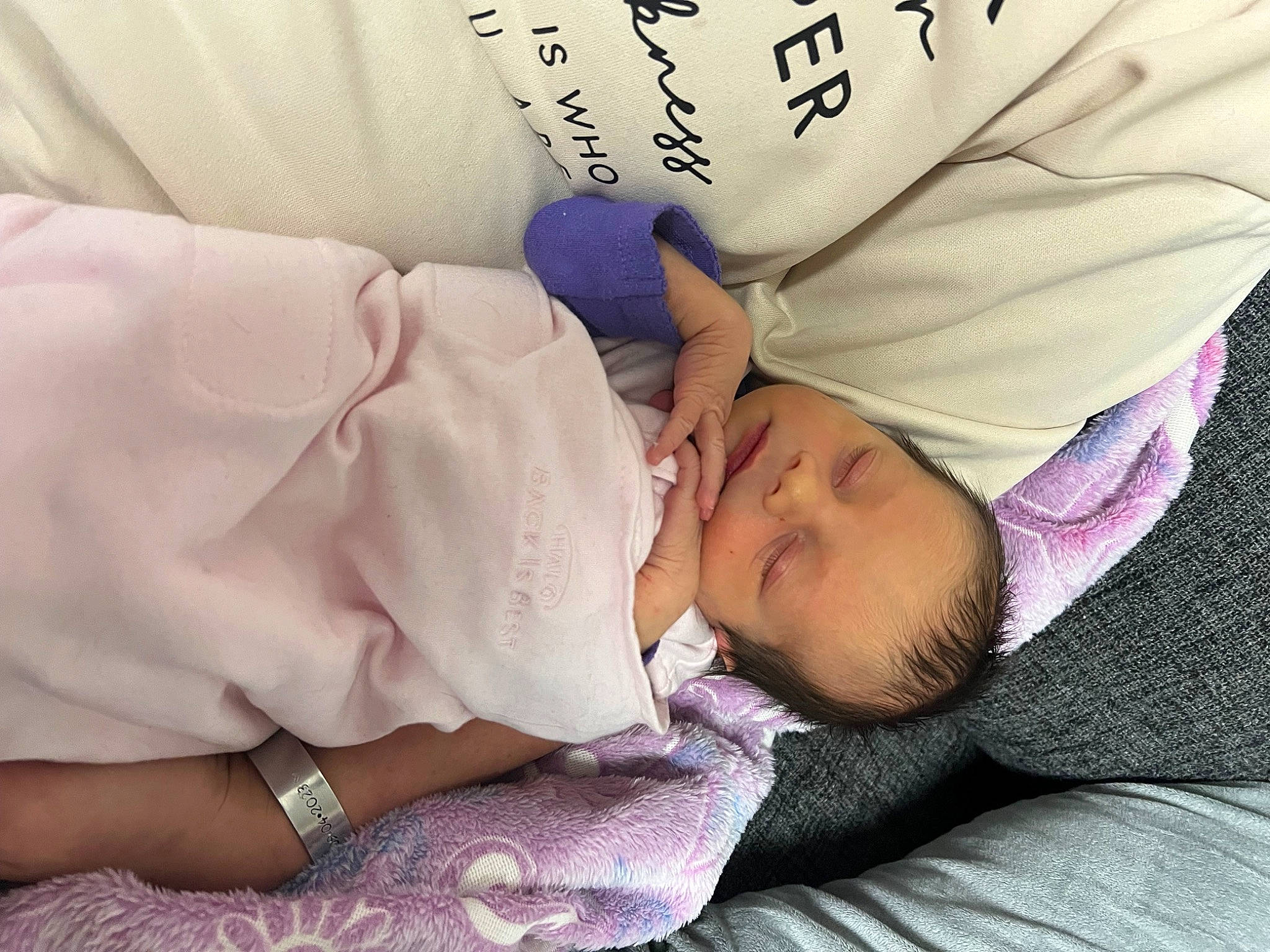 Blakely is registered to the contest to win money with this photo: baby, baby_products, baby_sleeping, baby_toddler_clothing, bedding, bedtime, blanket, child, comfort, happy, linens, nap, pattern, person, purple, room, skin, sleep, toddler, violet
