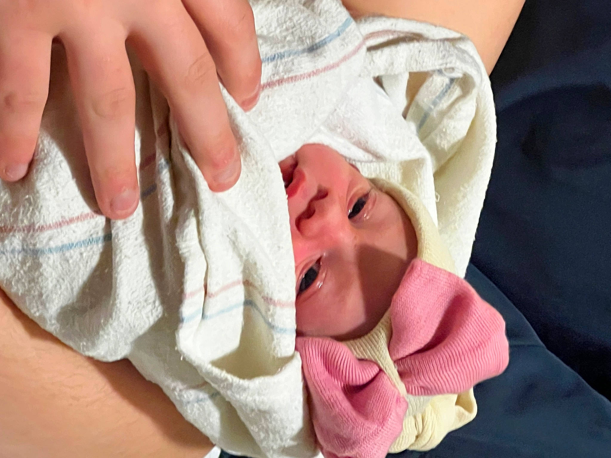 Blakely joined the competition — help win amazing prizes! baby, baby_toddler_clothing, cheek, child, close_up, comfort, event, face, fashion_accessory, finger, gesture, hand, happy, headwear, linens, nail, person, skin, smile, thumb