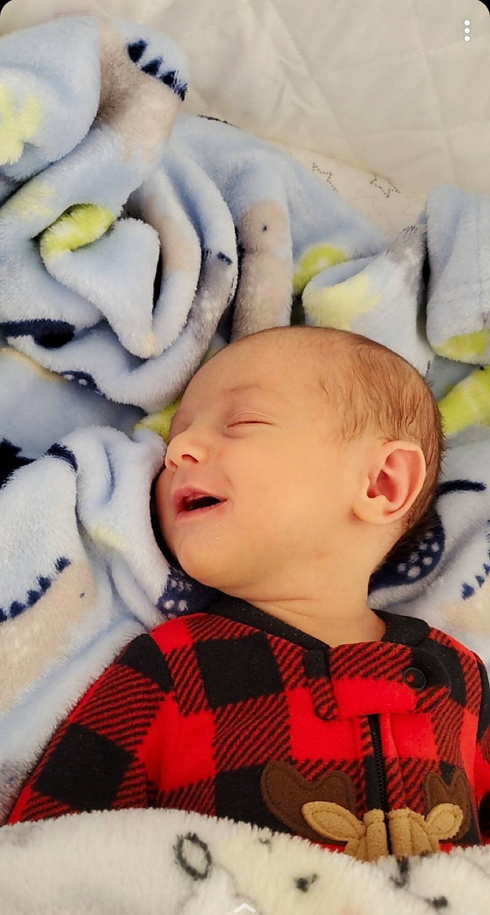 Huntley is registered to the contest to win money with this photo: baby, baby_products, baby_sleeping, baby_toddler_clothing, cheek, child, chin, collar, comfort, eyebrow, face, happy, linens, mouth, nose, pattern, person, skin, textile, toddler