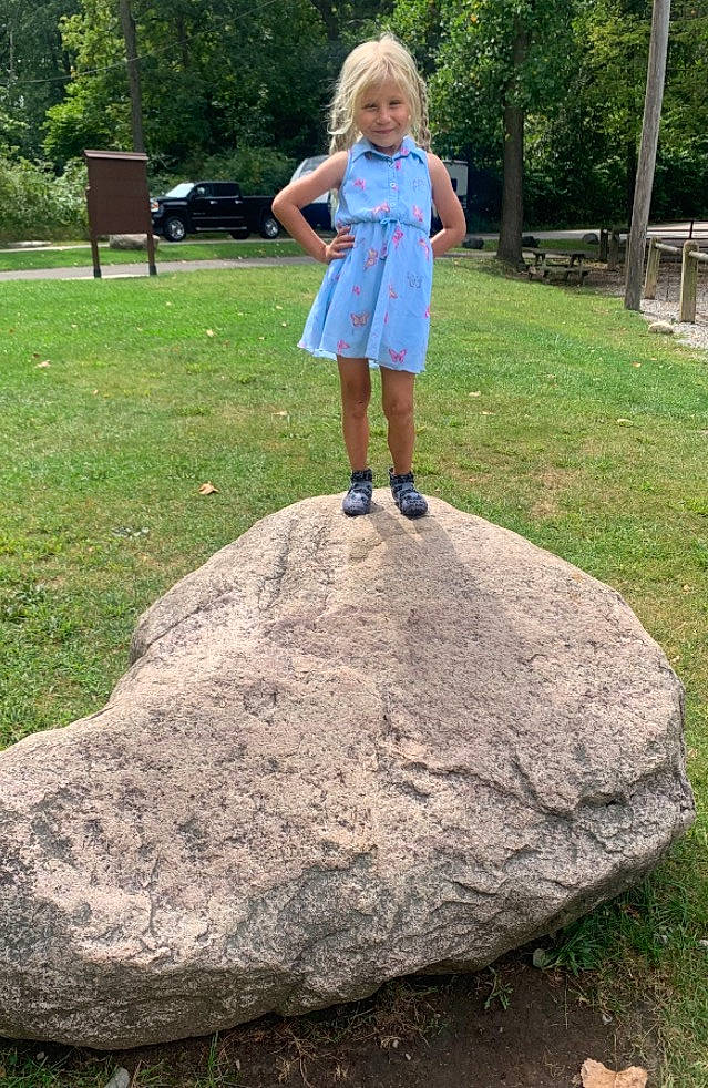 Anastazia is registered to the contest to win money with this photo: bedrock, concrete, electric_blue, fun, garden, grass, grassland, groundcover, joy, landscape, landscaping, leisure, person, plant, recreation, rock, soil, spring, toddler, tree