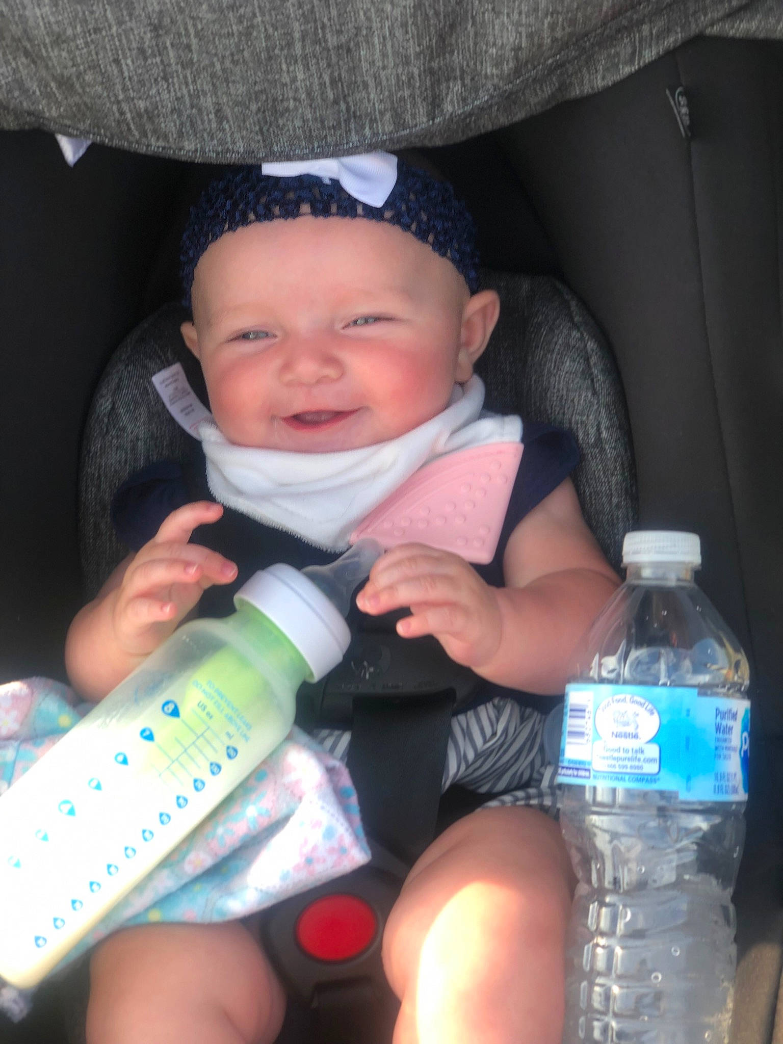 Elaina is registered to the contest to win money with this photo: baby, baby_bottle, baby_products, bottle, bottled_water, child, drink, drinking, drinking_water, drinkware, home_accessories, person, plastic_bottle, product, smile, tableware, toddler, water, water_bottle