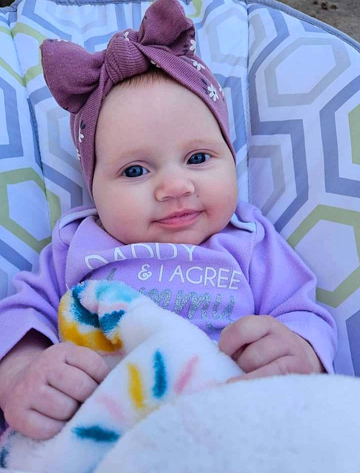 Camille joined the competition — help win amazing prizes! baby, baby_toddler_clothing, cheek, child, comfort, facial_expression, finger, hand, happy, headwear, linens, lip, person, pink, product, purple, skin, sleeve, smile, textile