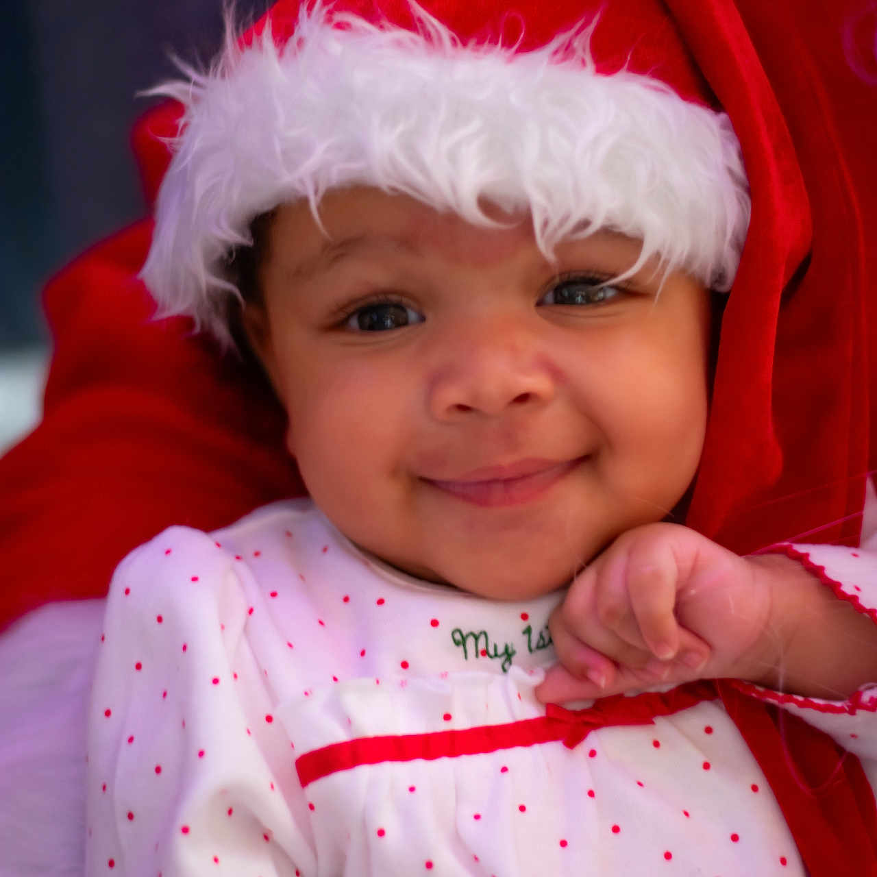 Cordelia joined the competition — help win amazing prizes! baby, child, smiling, santa_hat, christmas, holiday, red, white, polka_dot, cute, face, portrait, festive, infant, clothing, happy, closeup, winter, cheerful, hand