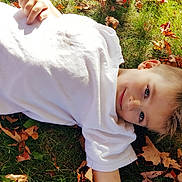 Silas is registered to the contest to win money with this photo: autumn, botany, child, grass, happy, leaf, people_in_nature, photography, plant, smile, toddler, tree