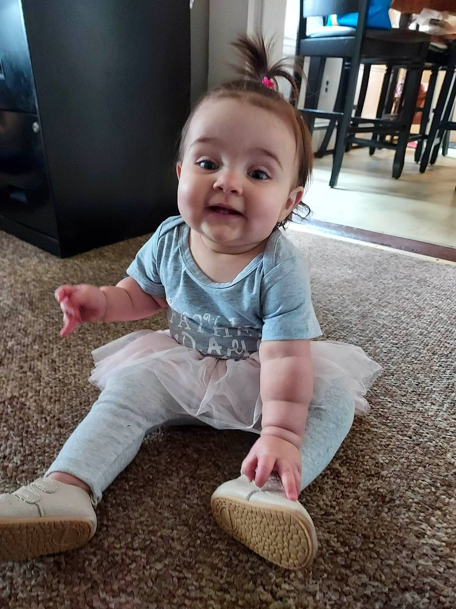 Rangeley joined the competition — help win amazing prizes! baby, baby_toddler_clothing, barefoot, cheek, child, finger, floor, flooring, foot, fun, grass, happy, human_leg, person, skin, sleeve, smile, sock, standing, toddler