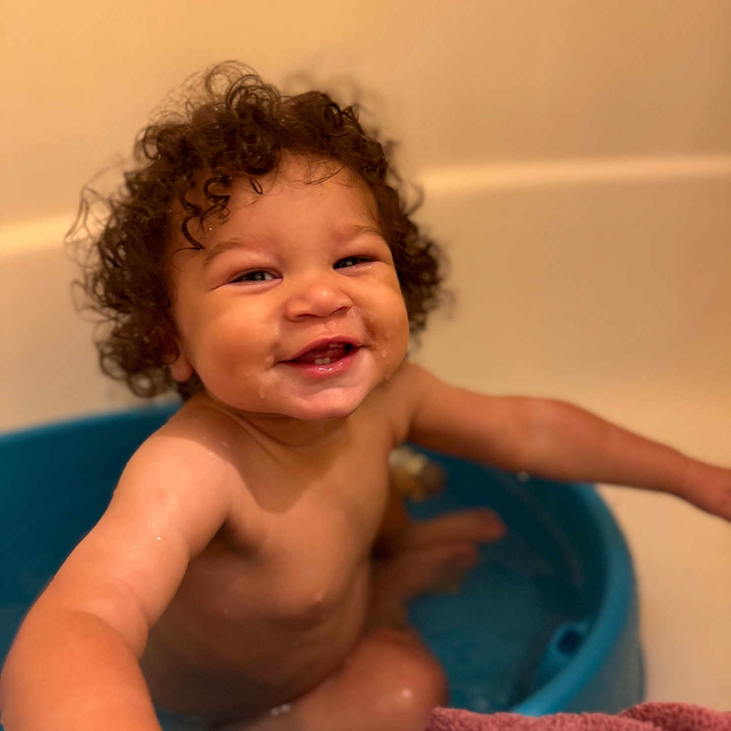 Grayson joined the competition — help win amazing prizes! arm, baby, bath, bathroom, blue_tub, child, curly_hair, cute, face, happy, indoor, person, sitting, skin, smiling, toddler, towel, water, wet, young