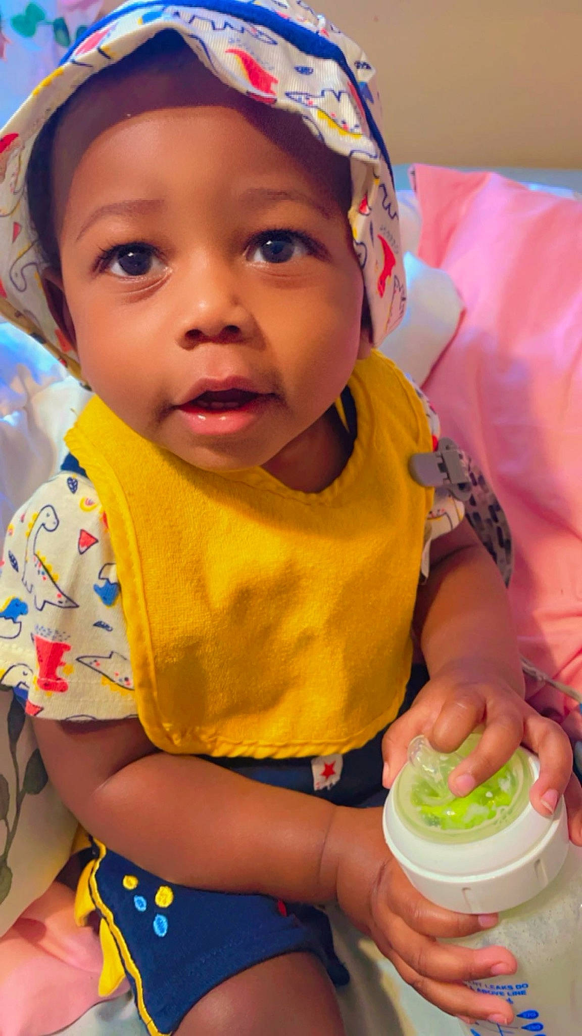Josiah joined the competition — help win amazing prizes! baby, baby_toddler_clothing, cap, child, dessert, fashion_accessory, finger, food, fun, green, happy, hat, headwear, iris, mouth, nose, person, play, skin, sweetness
