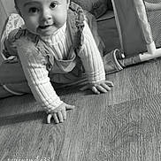 Luna participe au concours pour gagner de l'argent avec cette photo : baby, child, crawling, smiling, playpen, toy, soft_toy, floor, indoors, black_and_white, portrait, cute, infant, clothing, hand, face, head, eyes, expression, baby_girl