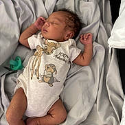 Adam joined the competition — help win amazing prizes! baby, sleeping, infant, onesie, bambi, thumper, cartoon, pacifier, bedding, blanket, soft, cute, child, peaceful, newborn, fabric, clothing, resting, indoors, portrait