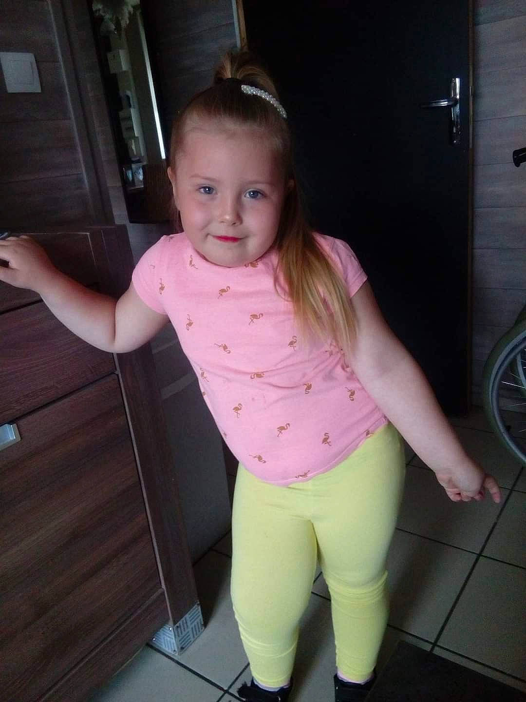 Shanna participe au concours pour gagner de l'argent avec cette photo : active_pants, baby_toddler_clothing, cheek, finger, floor, fun, head, joint, joy, knee, leg, magenta, neck, person, pink, shoulder, sleeve, smile, sportswear, thigh