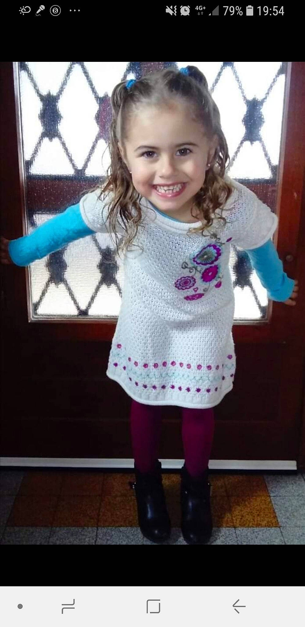 Saîna participe au concours pour gagner de l'argent avec cette photo : cheek, child, child_model, clothing, dress, face, footwear, head, joy, leg, leggings, magenta, outerwear, pattern, person, pink, purple, shoe, sleeve, smile