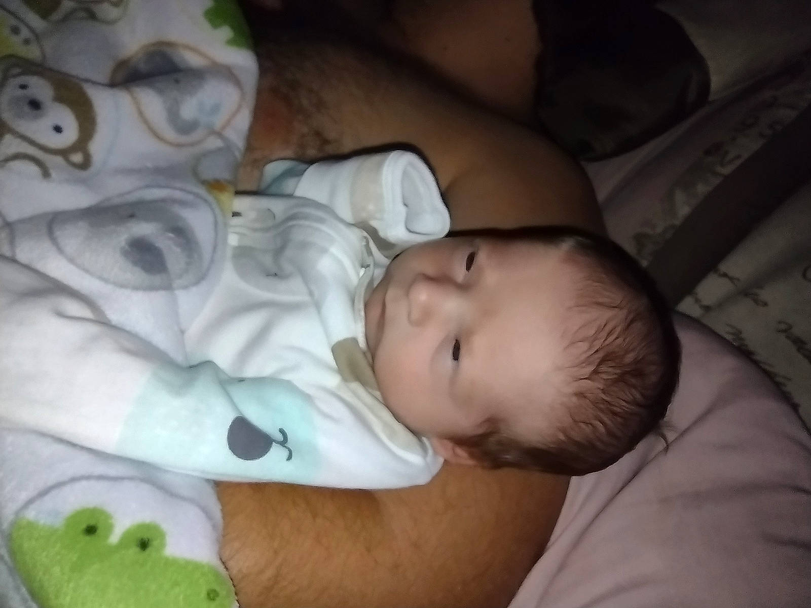 Sebastian is registered to the contest to win money with this photo: baby, baby_products, baby_toddler_clothing, bedtime, cheek, child, comfort, finger, grass, iris, linens, mammal, mouth, nap, nose, person, product, room, skin, toddler