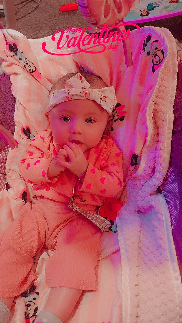 Eliana joined the competition — help win amazing prizes! baby, baby_products, baby_sleeping, baby_toddler_clothing, cap, cheek, child, comfort, eyelash, fashion_accessory, happy, headband, headgear, headwear, magenta, pattern, peach, person, pink, skin