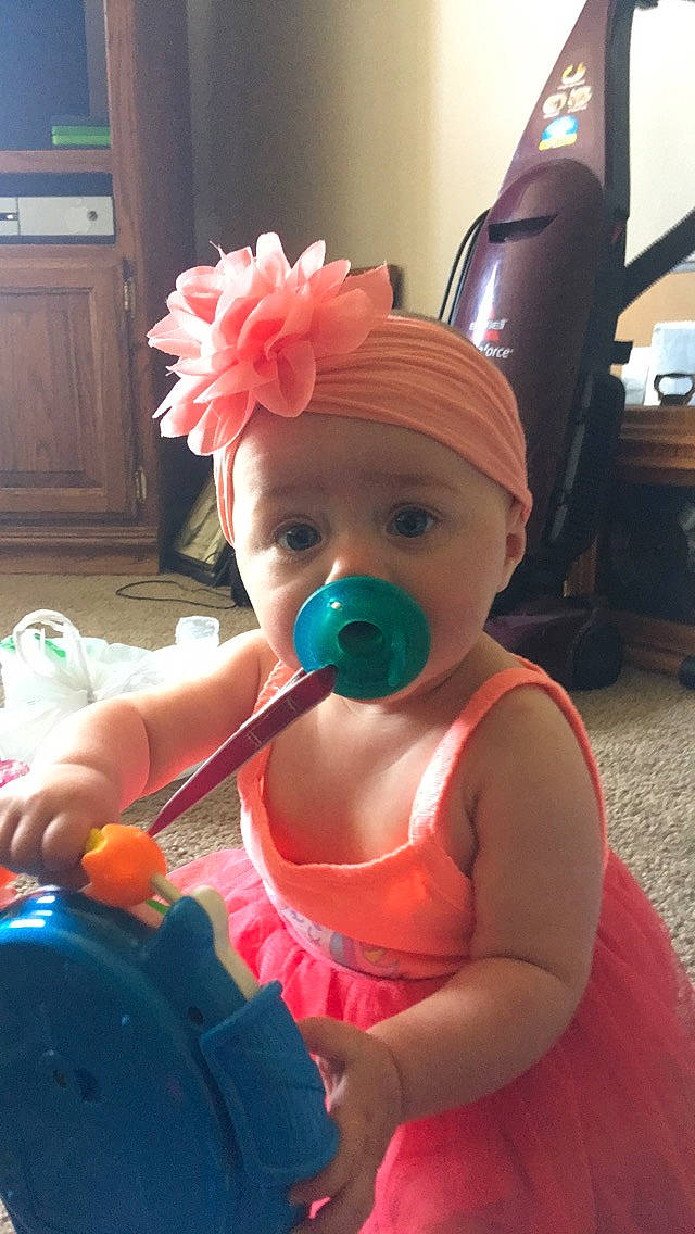 Kaliah joined the competition — help win amazing prizes! baby, child, electronic_device, headgear, headwear, nose, person, pink, play, toddler, vacation