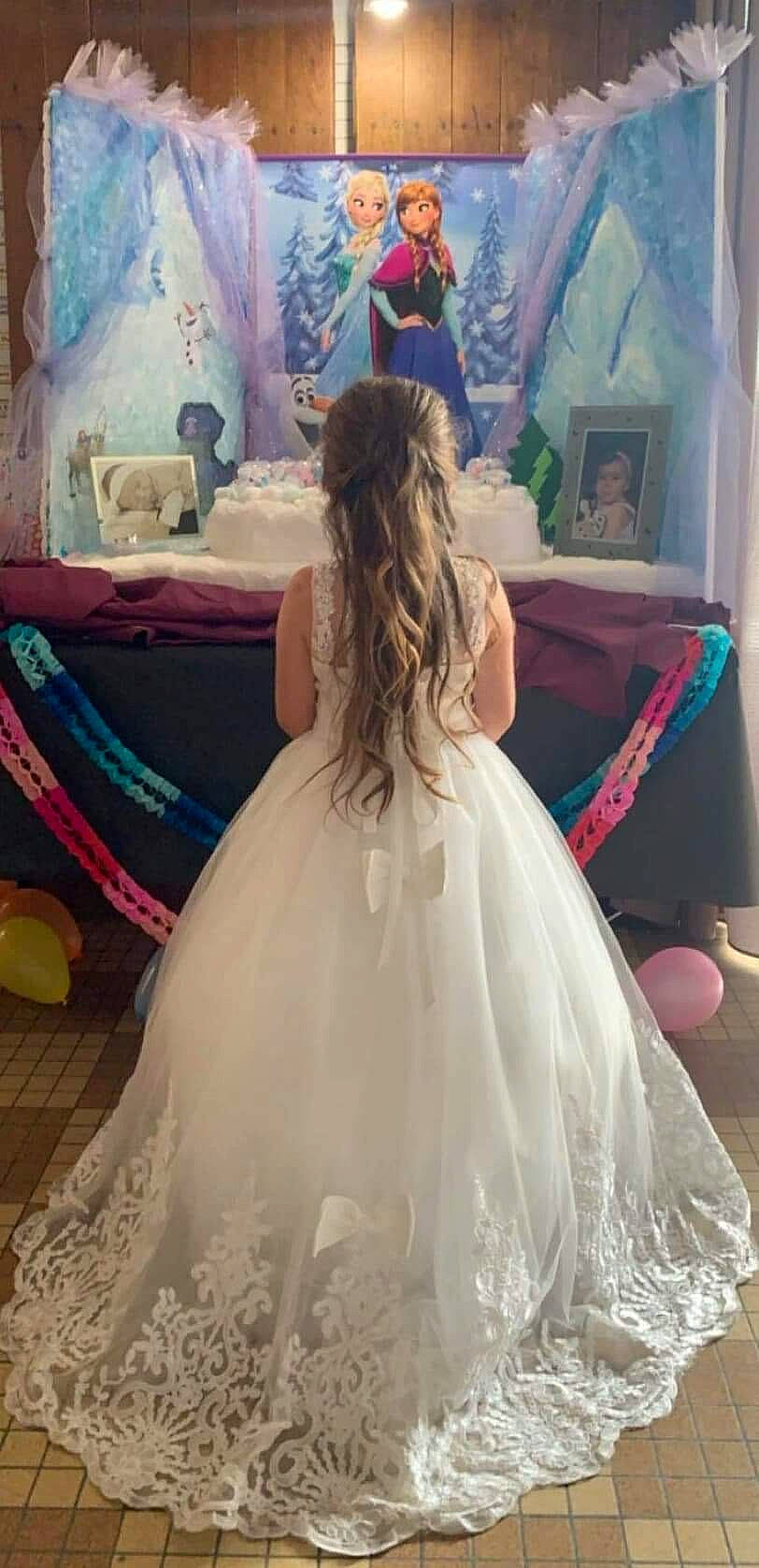 Ashley participe au concours pour gagner de l'argent avec cette photo : bridal_clothing, bridal_party_dress, bride, clothing, dress, embellishment, fashion, fashion_design, floor, flooring, formal_wear, gown, happy, person, pink, purple, shoulder, sleeve, textile, waist