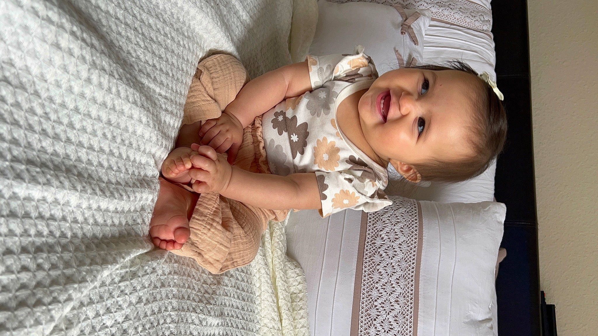 Avayah joined the competition — help win amazing prizes! baby, baby_toddler_clothing, child, comfort, finger, gesture, hand, happy, hat, human_body, joy, linens, nail, pattern, person, skin, sleeve, smile, textile, toddler
