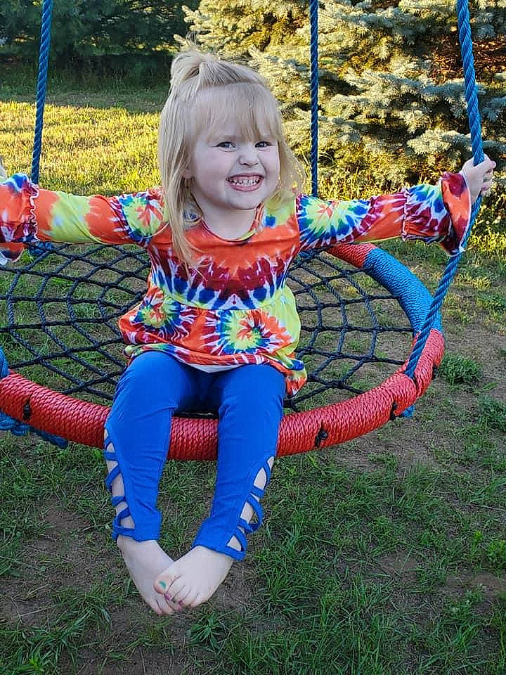 Annika joined the competition — help win amazing prizes! baby_toddler_clothing, child, city, electric_blue, event, fun, grass, green, happy, joy, leisure, outdoor_play_equipment, people_in_nature, person, plant, play, playground, playing_sports, recreation, smile