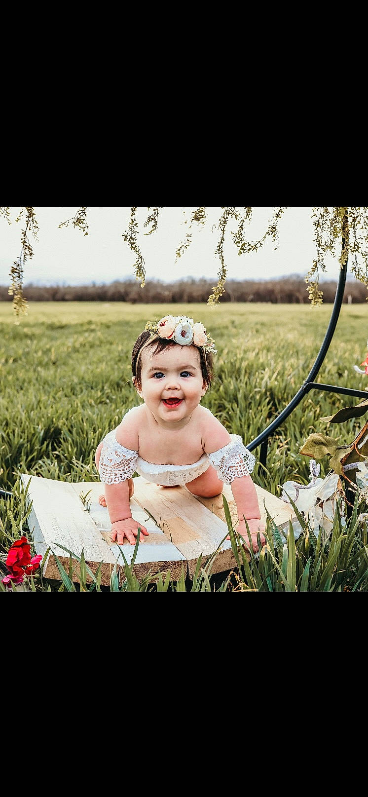 Amelia Rose joined the competition — help win amazing prizes! baby, baby_toddler_clothing, eye, flash_photography, flower, fun, grass, grassland, happy, headpiece, headwear, joy, meadow, people_in_nature, person, petal, plant, prairie, sky, smile