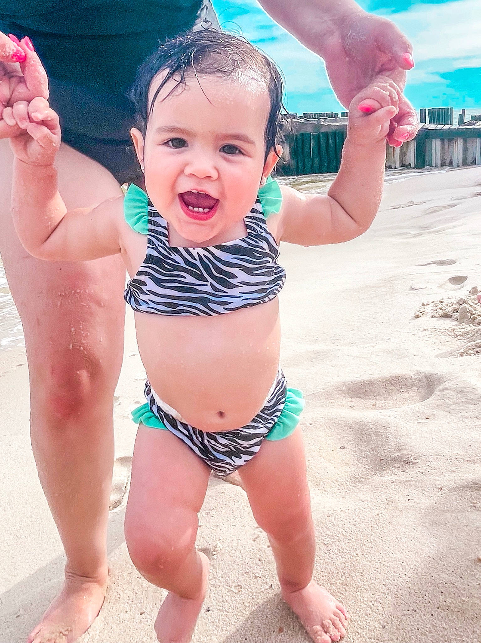 Amelia Rose joined the competition — help win amazing prizes! arm, blue, finger, gesture, hand, happy, head, human_body, joint, leg, muscle, one_piece_swimsuit, person, photograph, pink, shoulder, skin, sky, smile, swimwear