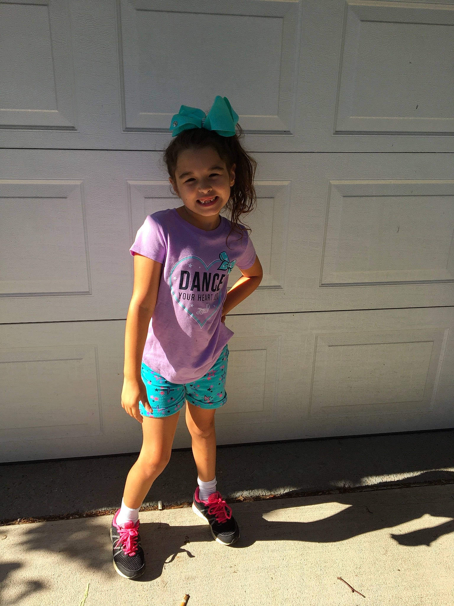 Ashlynn joined the competition — help win amazing prizes! abdomen, child, clothing, cool, day, footwear, fun, girl, headgear, joint, joy, person, pink, purple, recreation, shoe, shorts, shoulder, standing, t_shirt