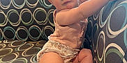 Gwendolyn joined the competition — help win amazing prizes! toddler, child, baby, pink_bow, pink_shoes, plush_toy, couch, patterned_fabric, indoor, window, daylight, cute, sitting, looking_away, clothing, furniture, armrest, expression, person, soft_toy